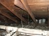 Attic buckets along with pipe insulation that may contain asbestos